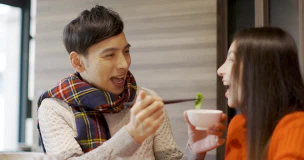 Young Man Feeding His Girfriend Restaurant — Stock Video