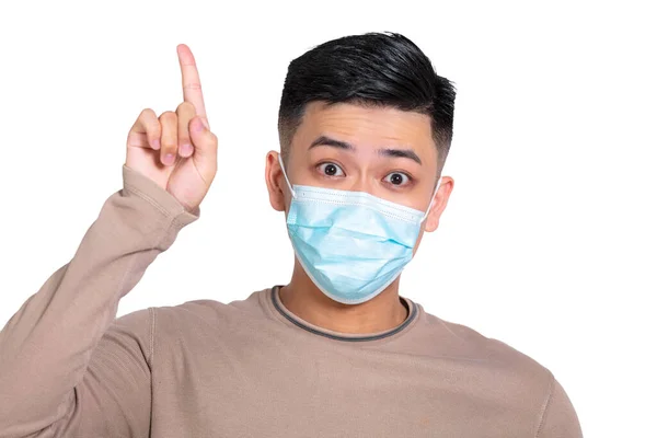 Young Man Face Mask Points His Hand — Stock Photo, Image