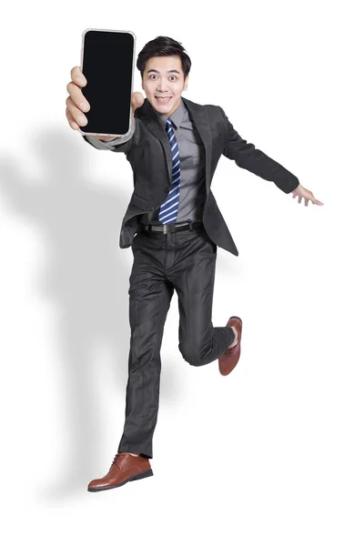 Excited Businessman Jumping Showing Mobile Phone Isolated White Background — Stock Photo, Image