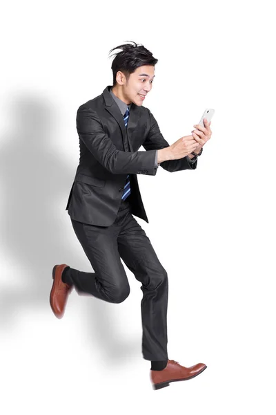 Emocionado Joven Hombre Negocios Guapo Saltando Utilizando Teléfono Móvil —  Fotos de Stock