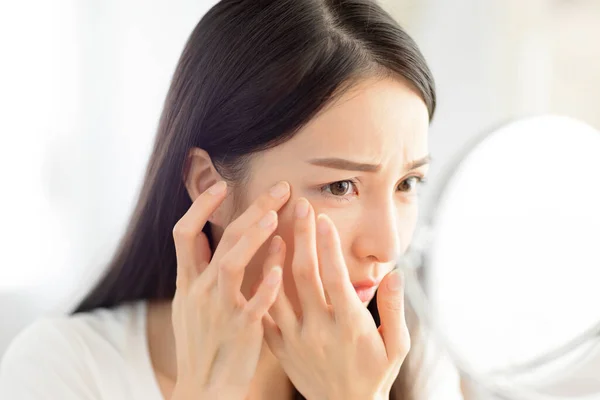 Young Woman Looking Mirror Checking Acne Problem Home — Stock Photo, Image