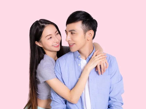 Young Couple Hugging Smiling Isolated Pink Background Looking Each Other — Stock Photo, Image