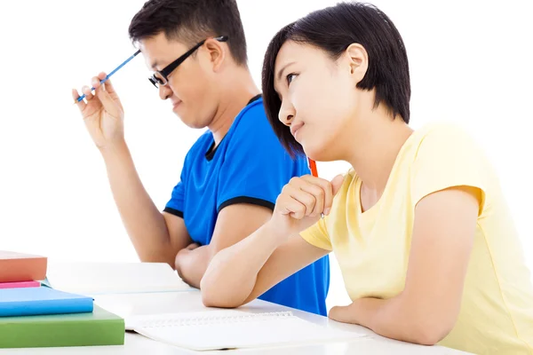 Young student girl thinking in class with classmates — Stock Photo, Image