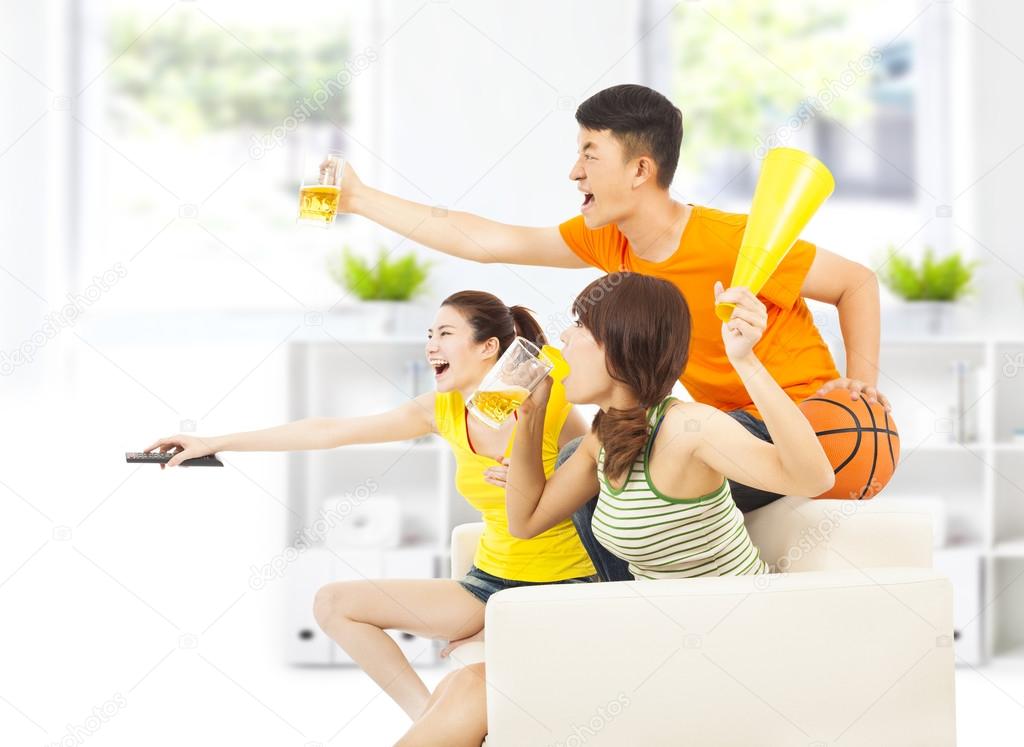 young people so excited to yelling and while watching tv