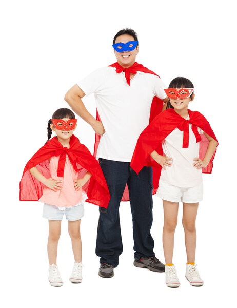Father and daughters wearing superhero suit. isolated on white