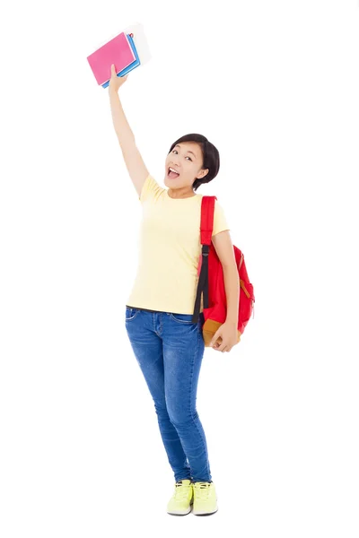 Asiático joven estudiante chica levantando un mano con libro — Foto de Stock
