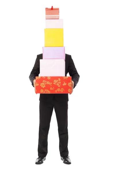 Affärsman håller presentförpackning. isolerad på vit — Stockfoto
