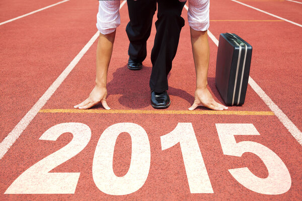 С Новым 2015 годом. Бизнесмен готовится к бегу
