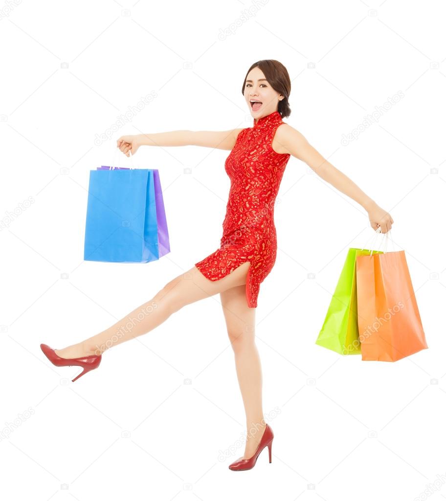 happy asian woman shopping for new year gifts