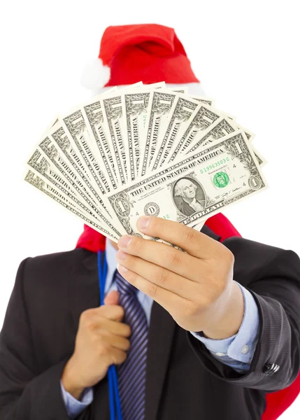 Geschäftsmann mit Weihnachtstasche und Geld — Stockfoto