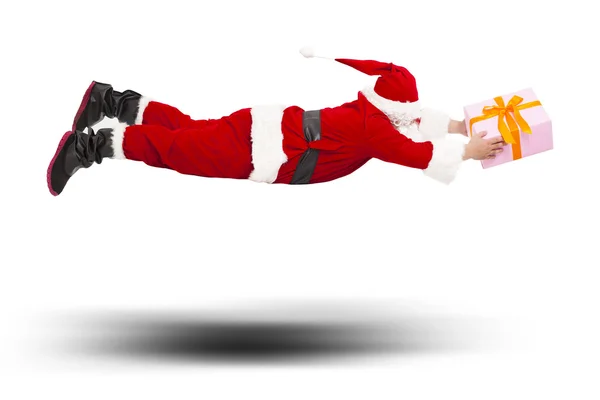Weihnachtsmann fliegt zur Lieferung einer Geschenkbox — Stockfoto
