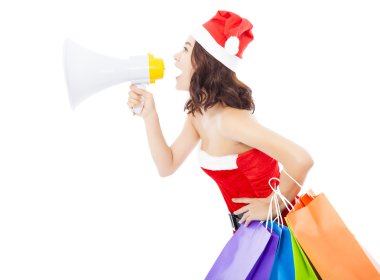 Noel Noel Baba kadın bir megafon hediye çantaları ile kullanma