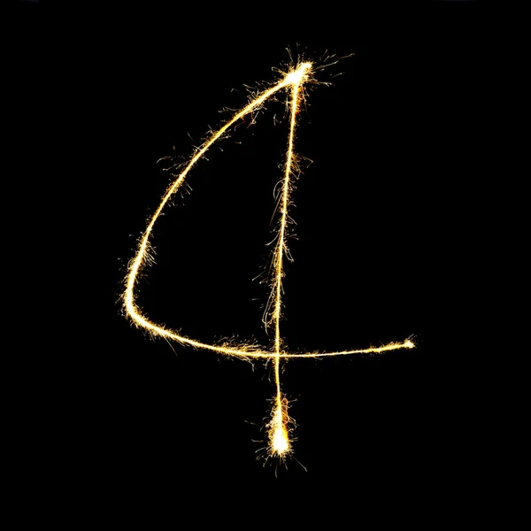 Burning sparkler stick and writing sparkling text . number four — Stock Photo, Image