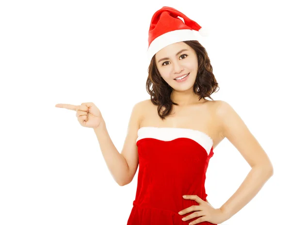 Sonriente joven mujer vistiendo traje de navidad con sombrero de santa sobre w — Foto de Stock