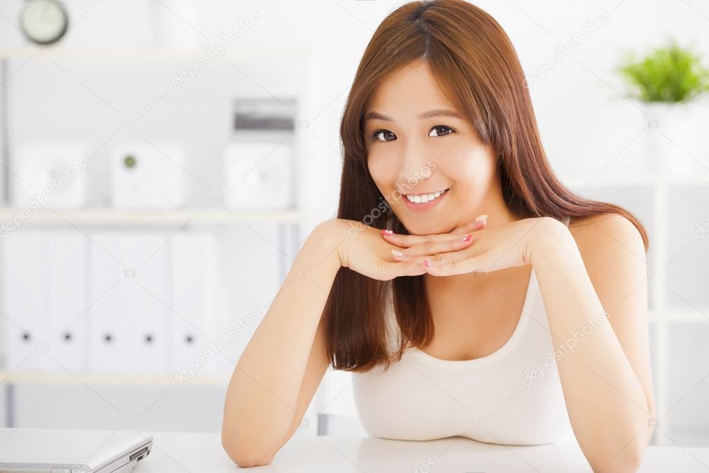 beautiful and smiling asian young woman