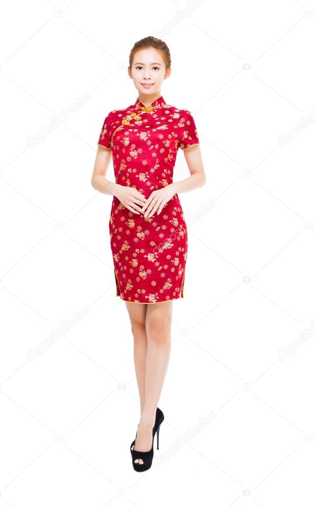 young woman making a elegant pose with cheongsam