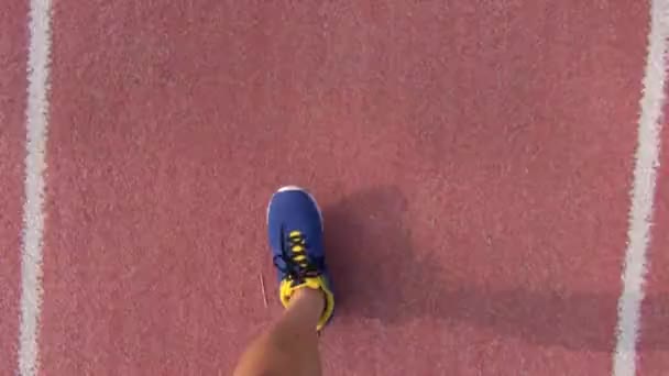 Runner running on the track in stadium — Stock Video