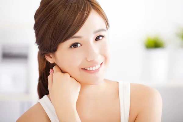 Smiling young asian woman face Royalty Free Stock Photos