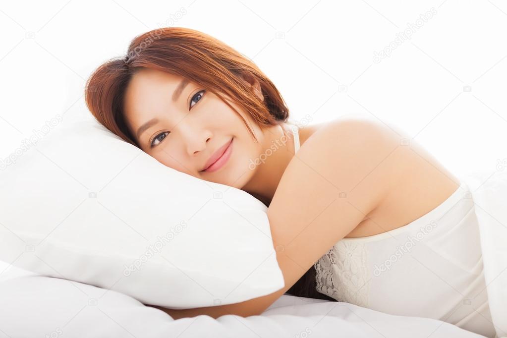 beautiful   asian woman sleeping in the bed