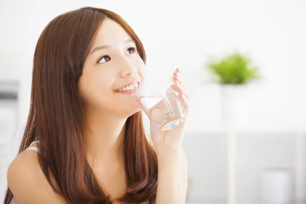 Young attractive woman drinking clean water — Stock Photo, Image