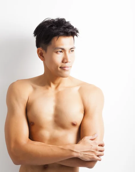 Άνθρωπος ασιατικές νέους αθλητισμού με μαριναρισμένα σώμα — Φωτογραφία Αρχείου
