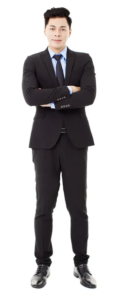 Young businessman standing and isolated on white — Stock Photo, Image
