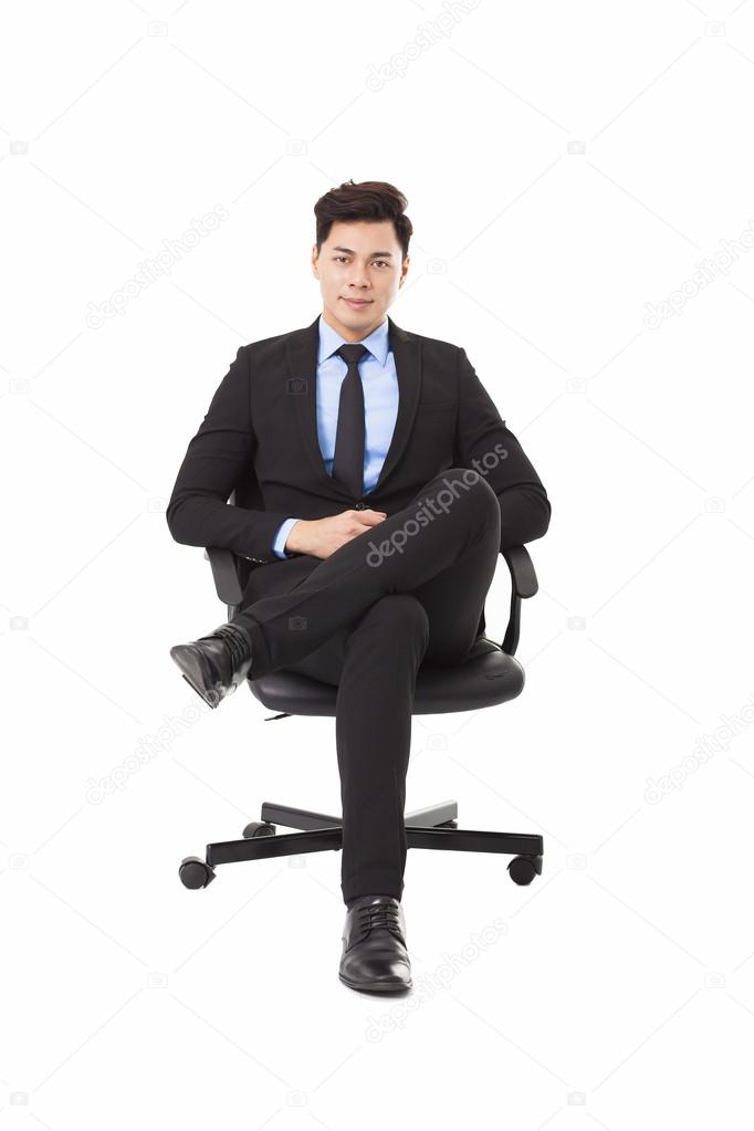 Young businessman sitting in a chair