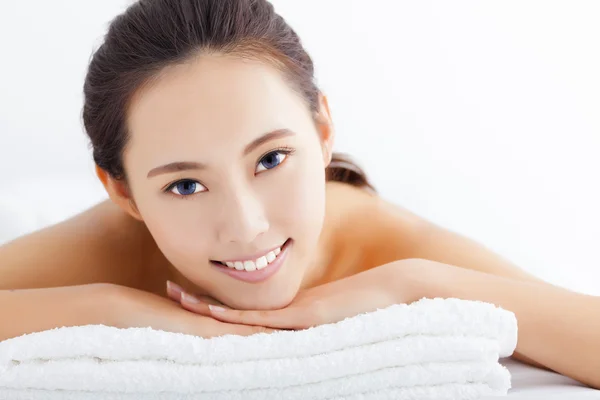 Young  woman getting spa treatment over white background — Stock Photo, Image