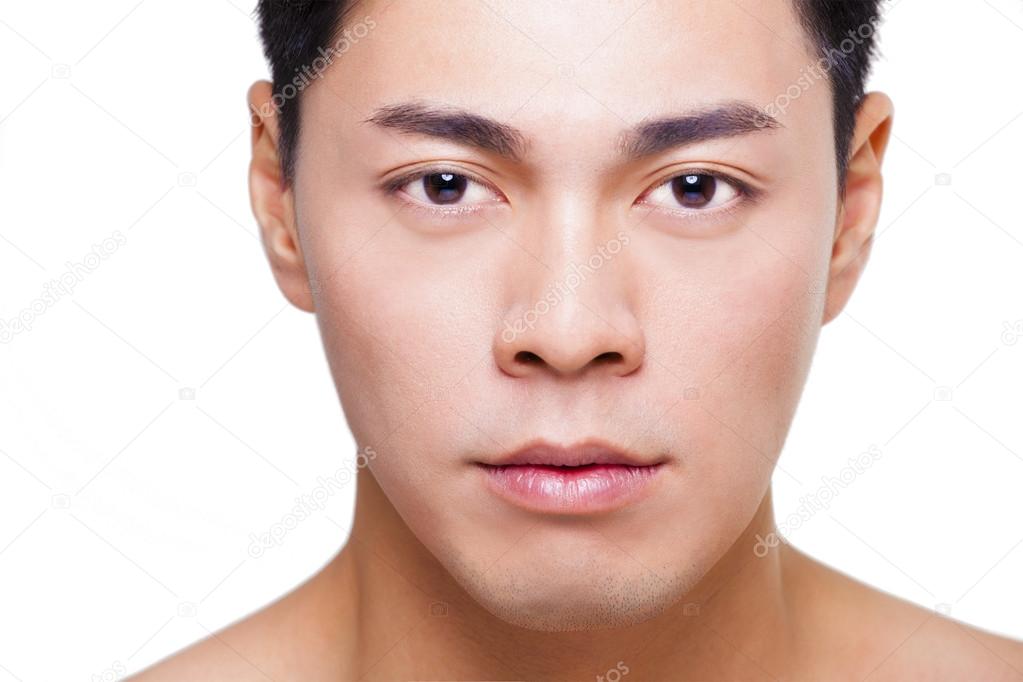 Closeup young asian man face isolated on white Stock Photo by ©tomwang
