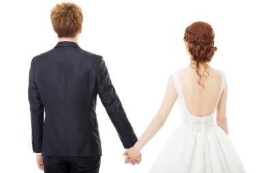 Eller gelin ve damat üzerinde beyaz izole Holding'in arkadan görünüm