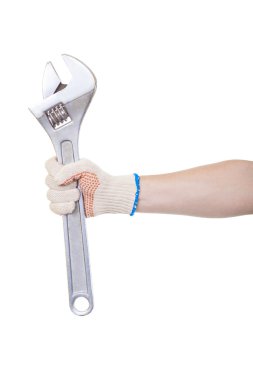 İngiliz anahtarını tutan işçinin el