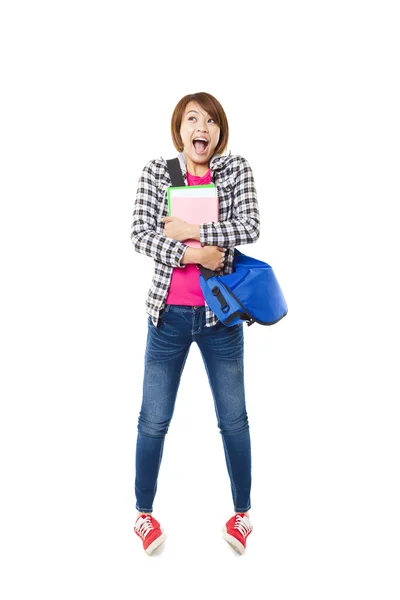 Young happy asian student with books and isolated on white — Stock Photo, Image