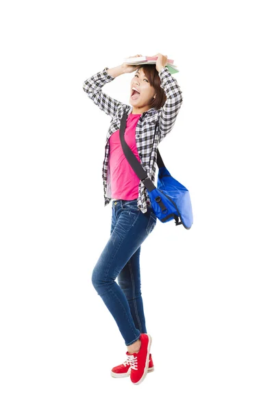 Young happy asian student with books and isolated on white — Stock Photo, Image