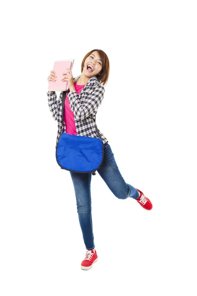 Young happy asian student with books and isolated on white — Stock Photo, Image