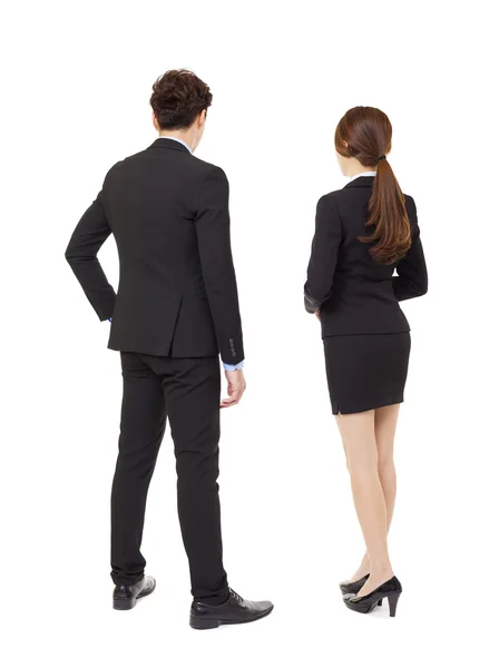 Vista posteriore uomo d'affari e donna d'affari in piedi — Foto Stock