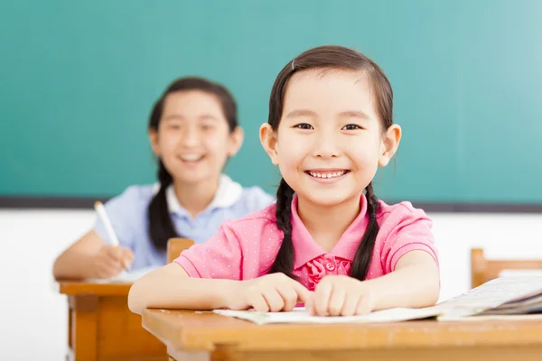 教室で幸せな女の子 ストック画像