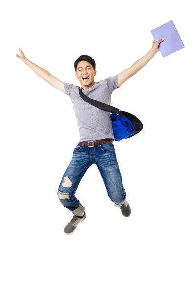 Jovem feliz estudante saltando — Fotografia de Stock