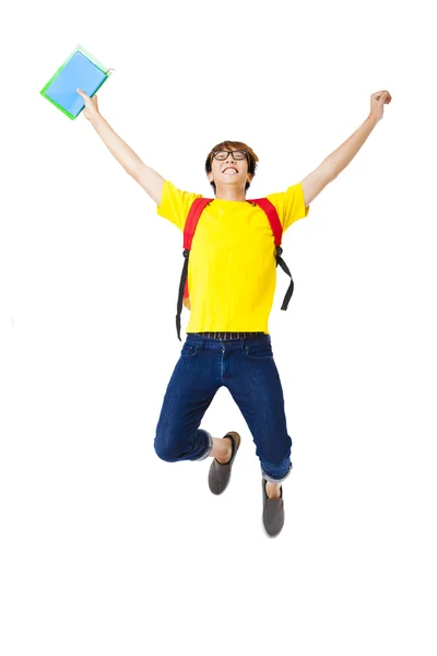 Jovem homem feliz estudante saltando — Fotografia de Stock