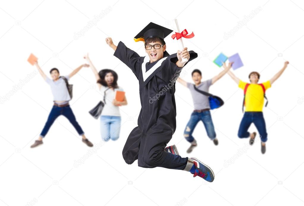 Happy  student group in graduate robe jumping together