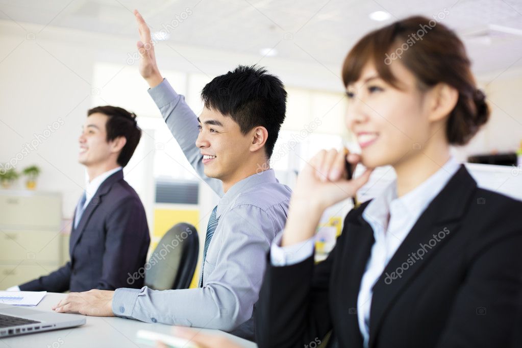 Business woman with her staff in conference room