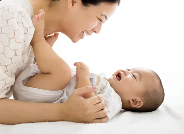 Happy mother with smiling baby boy — Stock Photo, Image