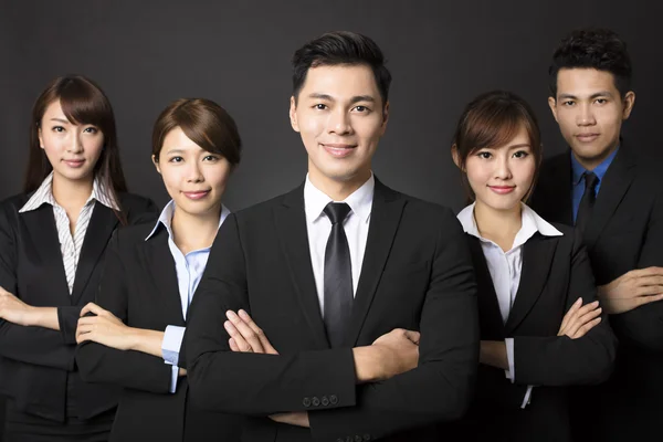 Jovem empresário com equipe de negócios de sucesso — Fotografia de Stock