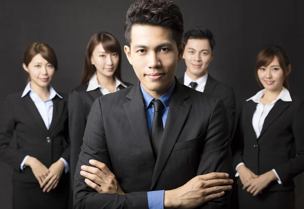 Young businessman with successful business team — Stock Photo, Image