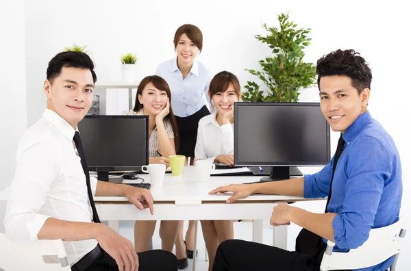 Happy business people working in the office — Stock Photo, Image