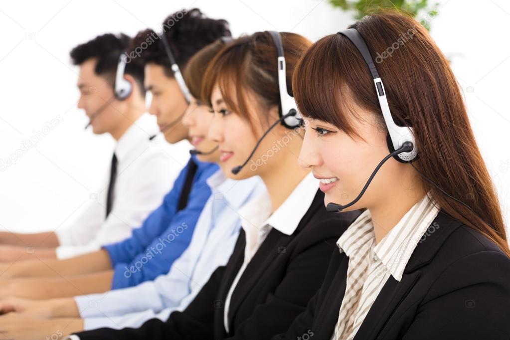 young business people and colleagues working in  call center 