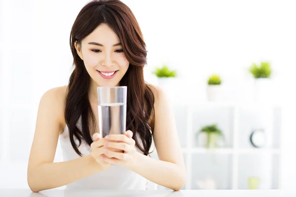 Young attractive woman with clean water — Stock Photo, Image