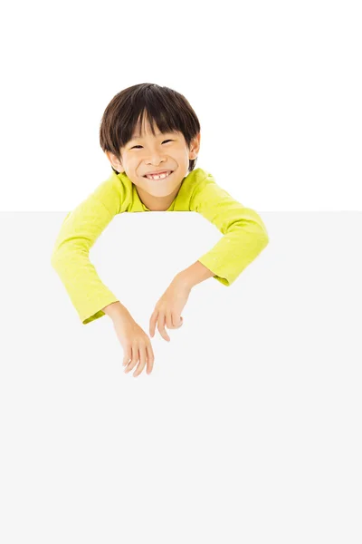 Szczęśliwy chłopiec przytrzymanie puste pusty transparent — Zdjęcie stockowe