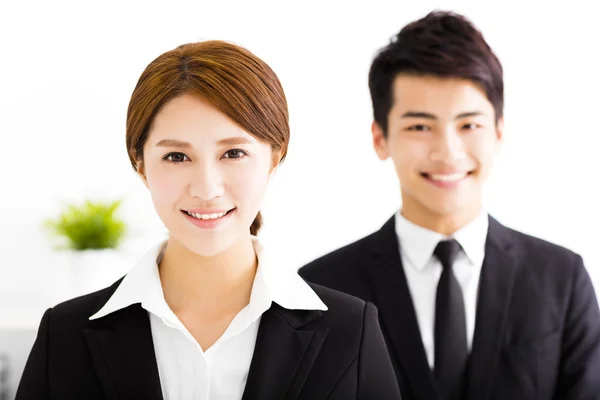 Happy business man and woman standing  in office — Stock Photo, Image