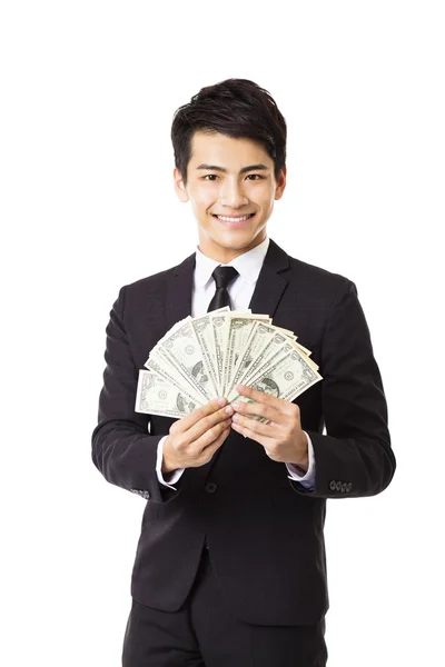 Para tutan mutlu genç iş adamı — Stok fotoğraf