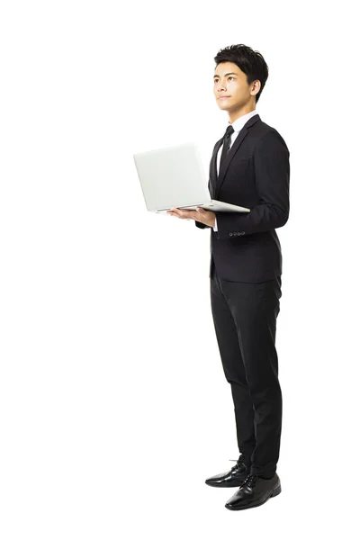 Tam uzunlukta iş adamı ile üzerine beyaz izole laptop — Stok fotoğraf